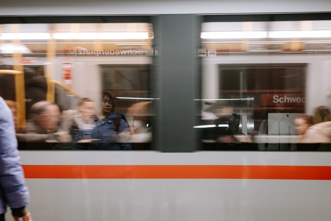 Austrian train station with travelers and signs